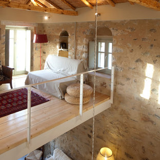 Foto di un soggiorno mediterraneo stile loft