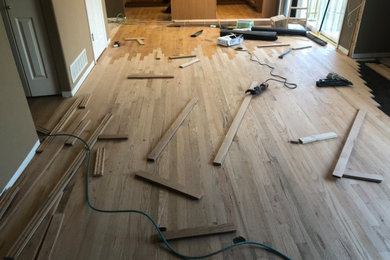 Inspiration for a dark wood floor and brown floor living room remodel in Denver