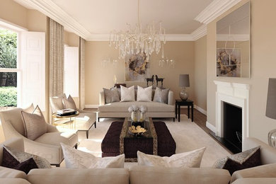Design ideas for a large contemporary formal enclosed living room in Wiltshire with beige walls, dark hardwood flooring, a standard fireplace, a stone fireplace surround, no tv and brown floors.