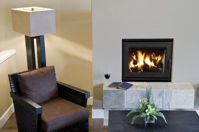 Inspiration for a mid-sized modern formal and enclosed living room remodel in Toronto with a standard fireplace