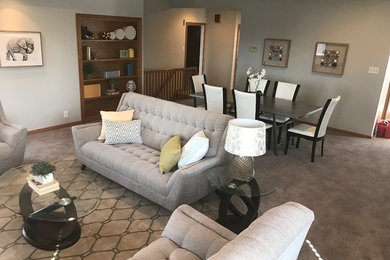 Diseño de salón para visitas cerrado clásico renovado de tamaño medio sin chimenea y televisor con paredes grises, moqueta y suelo beige