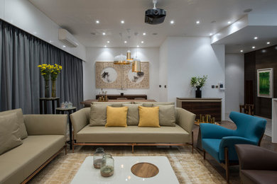 Design ideas for a contemporary living room in Mumbai.