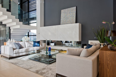 Photo of a contemporary open plan living room in Other with grey walls, a stone fireplace surround and a ribbon fireplace.