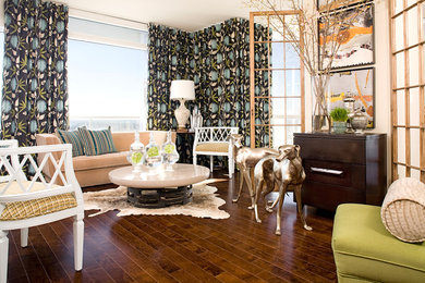 Inspiration for an eclectic medium tone wood floor living room remodel in Atlanta