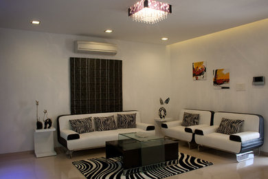 This is an example of a contemporary living room in Hyderabad.