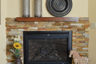 Inspiration for a mid-sized timeless formal and open concept dark wood floor living room remodel in Albuquerque with beige walls, a standard fireplace, a stone fireplace and no tv