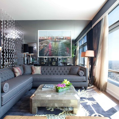 Inspiration for an eclectic living room remodel in Los Angeles with black walls