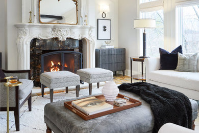 Living room - large mediterranean open concept living room idea in Grand Rapids with white walls, a ribbon fireplace and a plaster fireplace