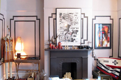 Example of an eclectic living room design in New York with a standard fireplace and a brick fireplace