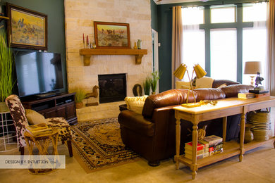 Inspiration for a large rustic open concept living room remodel in Houston with blue walls and a tv stand