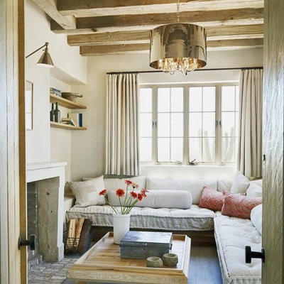 Tuscan enclosed living room photo in Phoenix with beige walls and no tv