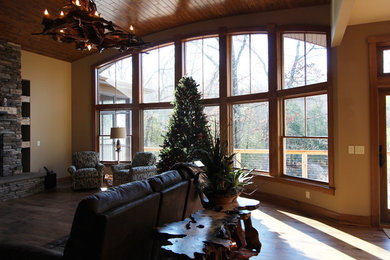 Living room - rustic living room idea in Grand Rapids