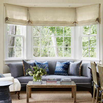Living room - transitional formal and enclosed carpeted living room idea in New York with beige walls