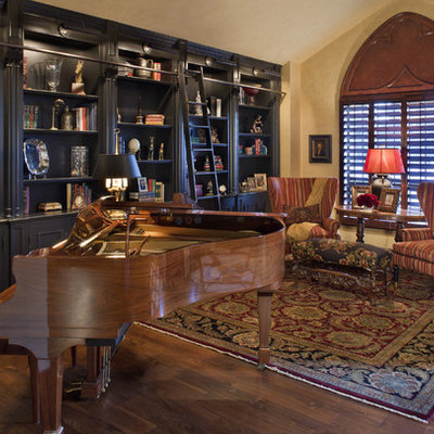 Living room library - traditional living room library idea in Phoenix