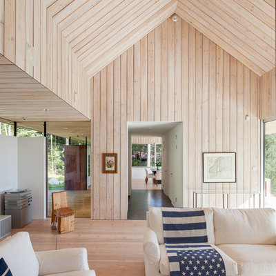 Inspiration for a large scandinavian formal and open concept light wood floor living room remodel in Stockholm with beige walls, no fireplace and no tv