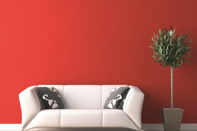 Photo of a contemporary living room in Oxfordshire with red walls.