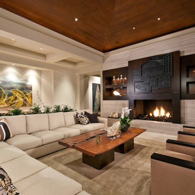 Huge trendy living room photo in San Diego with beige walls, a standard fireplace and no tv