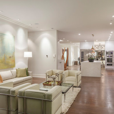 Example of a large trendy formal and open concept dark wood floor and brown floor living room design in San Francisco with white walls, no fireplace and no tv