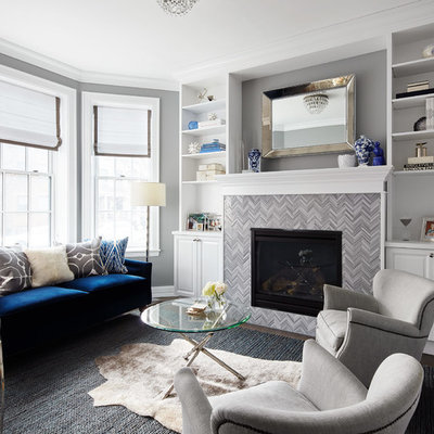 Inspiration for a mid-sized transitional open concept dark wood floor and brown floor living room remodel in Chicago with gray walls, a standard fireplace, a tile fireplace and no tv
