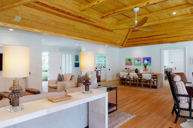 Example of a beach style living room design in Other