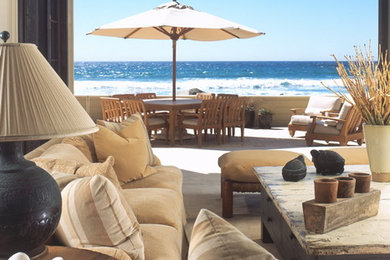 Beach style living room photo in San Diego