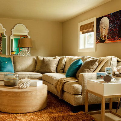 Living room - coastal living room idea in Portland with beige walls