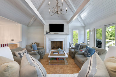 Design ideas for a coastal living room in Charleston.