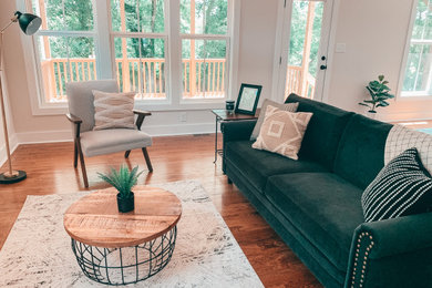 Example of a trendy living room design in Raleigh