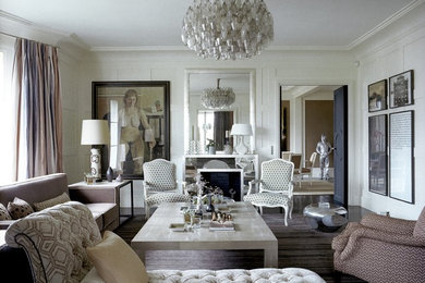 Example of a transitional living room design in Paris with white walls