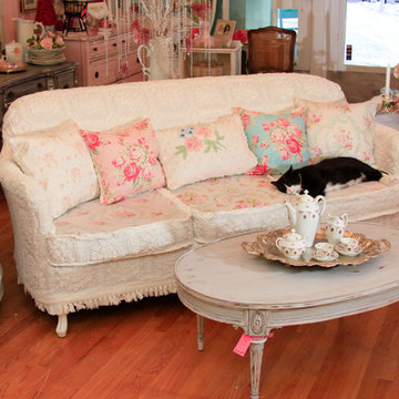 shabby chic sofa slipcovered with vintage chenille bedspreads and roses fabrics