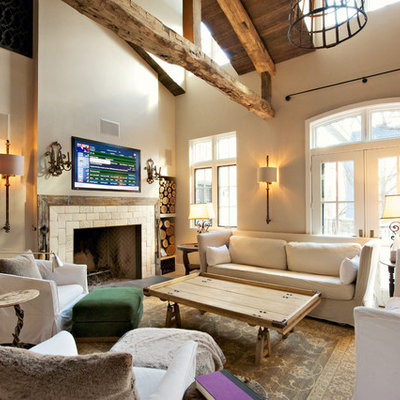 Inspiration for a farmhouse formal and open concept living room remodel in Philadelphia with beige walls, a standard fireplace and a wall-mounted tv