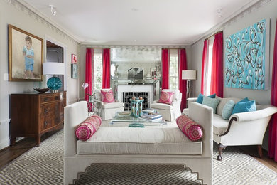 Источник вдохновения для домашнего уюта: парадная гостиная комната в современном стиле с серыми стенами, темным паркетным полом и стандартным камином без телевизора