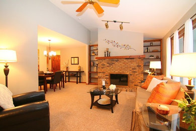 Large transitional formal and enclosed carpeted living room photo in Milwaukee with white walls, no fireplace and no tv