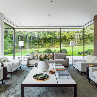 Photo of a contemporary formal enclosed living room in London with brown walls.