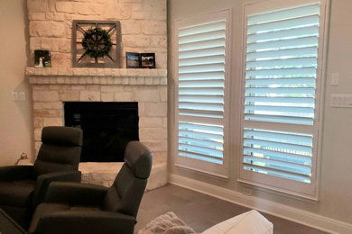 Polycore Shutters with hidden tilt and divider rail.