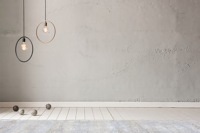 Imagen de salón para visitas abierto contemporáneo de tamaño medio con paredes grises y suelo de madera clara