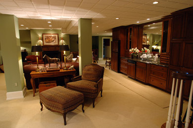 Example of a large transitional enclosed carpeted living room design in Other with a bar, green walls, a standard fireplace, a wood fireplace surround and no tv