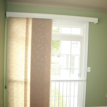 Simple Solutions in Window Treatments - Panel Track Shade with wood valance