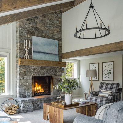Living room - rustic open concept carpeted and gray floor living room idea in Burlington with white walls and a standard fireplace