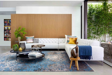 Photo of a large contemporary formal open plan living room in Miami with white walls, porcelain flooring and grey floors.