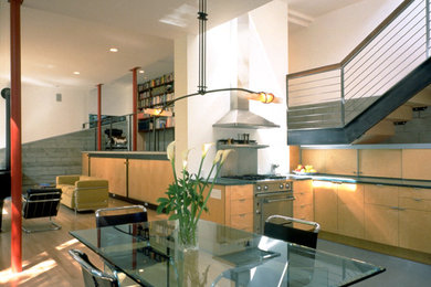 Living room - contemporary open concept concrete floor living room idea in San Francisco