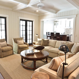 Inspiration for a huge coastal living room remodel in Charleston with white walls