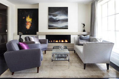 Design ideas for a contemporary formal and grey and purple living room in Toronto with white walls, a ribbon fireplace and a stone fireplace surround.