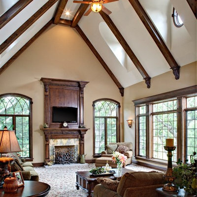 Example of a large classic open concept carpeted and multicolored floor living room design in Chicago with beige walls, a standard fireplace, a tile fireplace and a wall-mounted tv