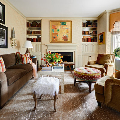 Elegant formal living room photo in Charlotte with beige walls and a standard fireplace