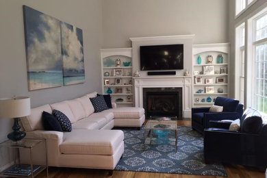 This is an example of a coastal living room in Other.