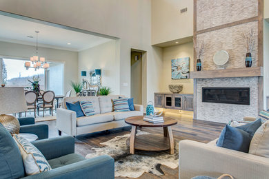 Inspiration for a contemporary open concept medium tone wood floor living room remodel in Dallas with beige walls, a standard fireplace and a stone fireplace