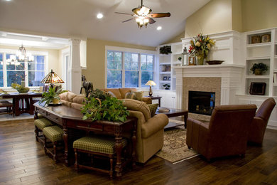 Inspiration for a mid-sized timeless formal and open concept dark wood floor and brown floor living room remodel in Salt Lake City with beige walls, a standard fireplace, a stone fireplace and no tv