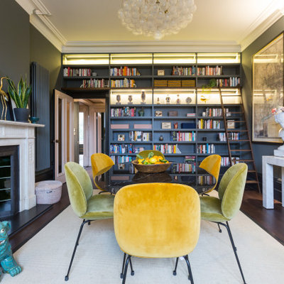 Living room - large contemporary formal and enclosed dark wood floor and brown floor living room idea in London with a standard fireplace, a stone fireplace, blue walls and no tv