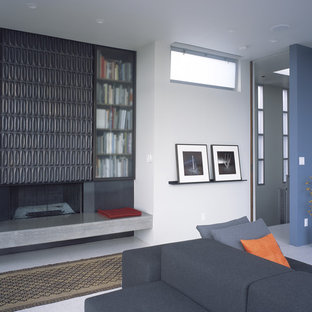 Inspiration pour un salon minimaliste avec un manteau de cheminée en carrelage.